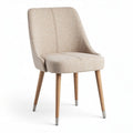 Textured fabric dining chair with wooden legs in beige color 45 x 55 x 85cm